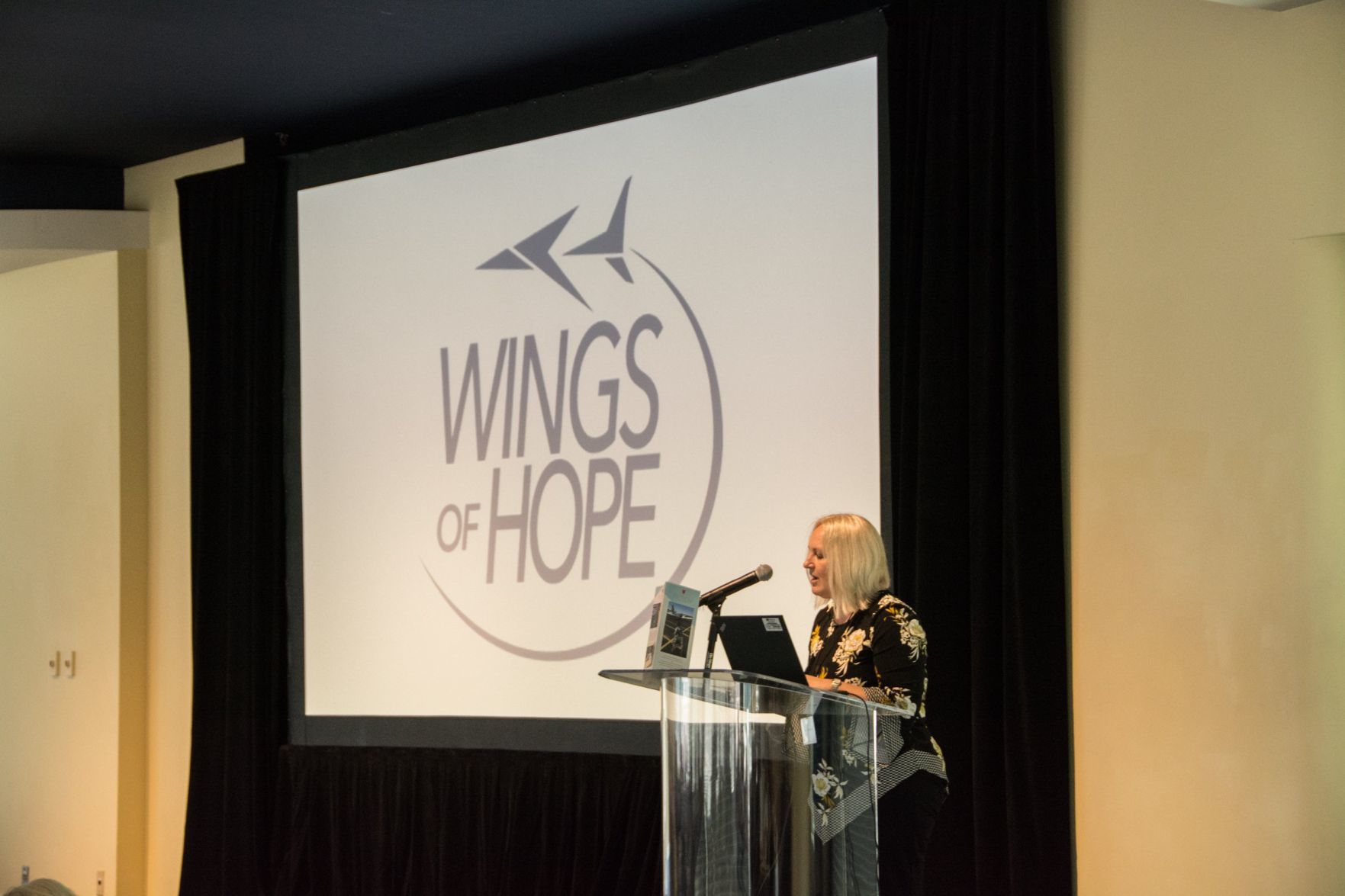 Angela Walleman gives an invocation before lunch begins